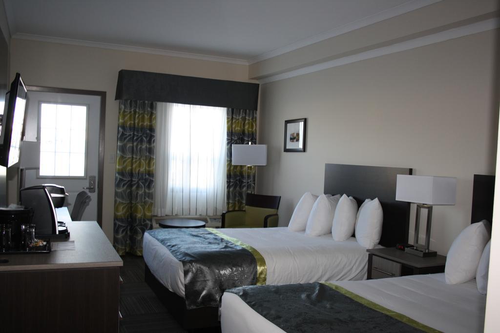Crossroads Inn & Suites Paradise Esterno foto